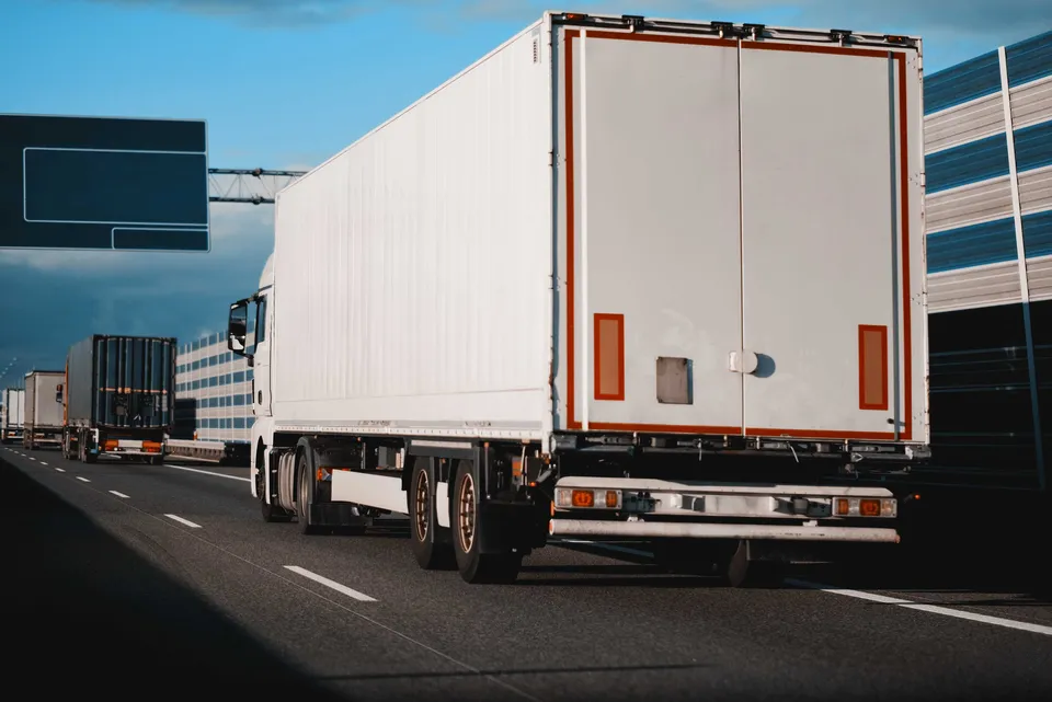 Truck driving down the highway in Massachusetts